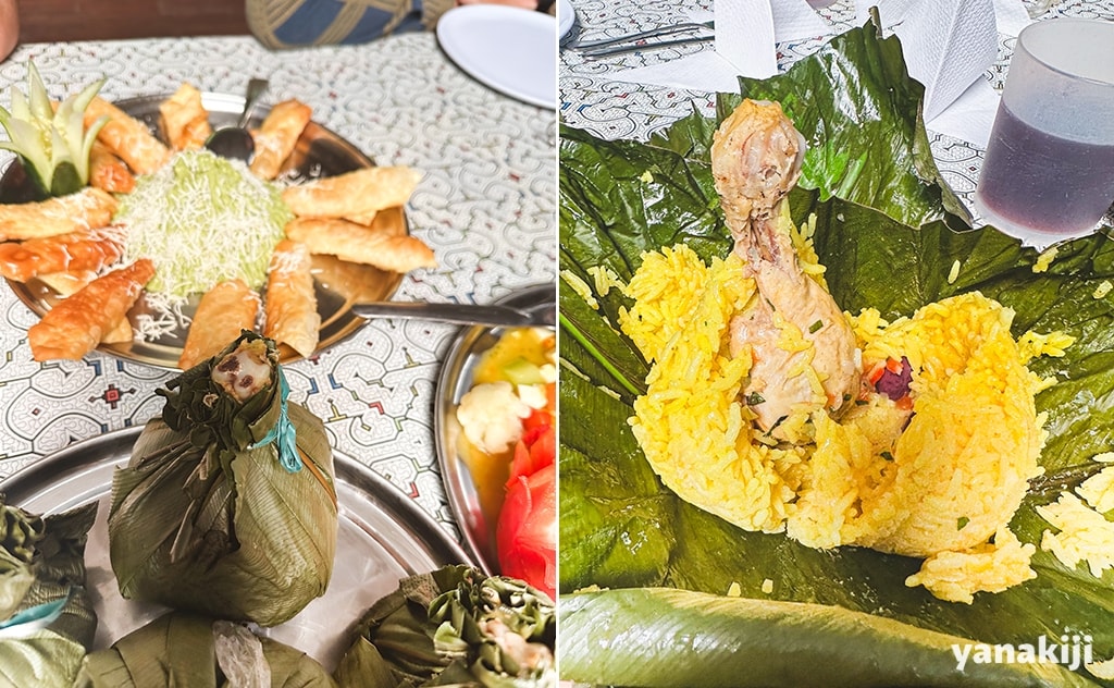 写真:ホアンが取った葉っぱの中にはターメリックライスに鶏肉や卵などが蒸されて入っていた。